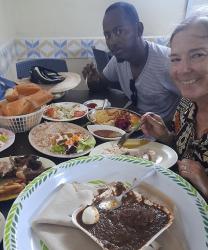 Agent Ahssan and Alison at lunch in Djibouti